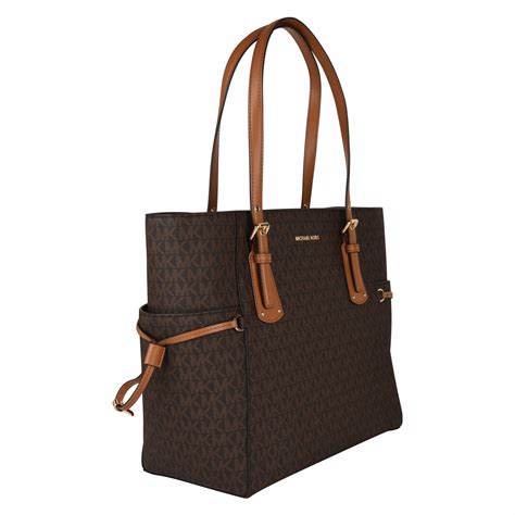 michael kors enveople flip tote|Michael Kors ladies tote bag.